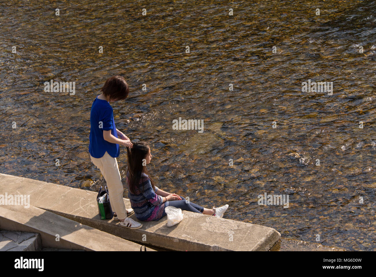 Hair ararnging on banks of River Miya-gawa, Takayama, Japan Stock Photo