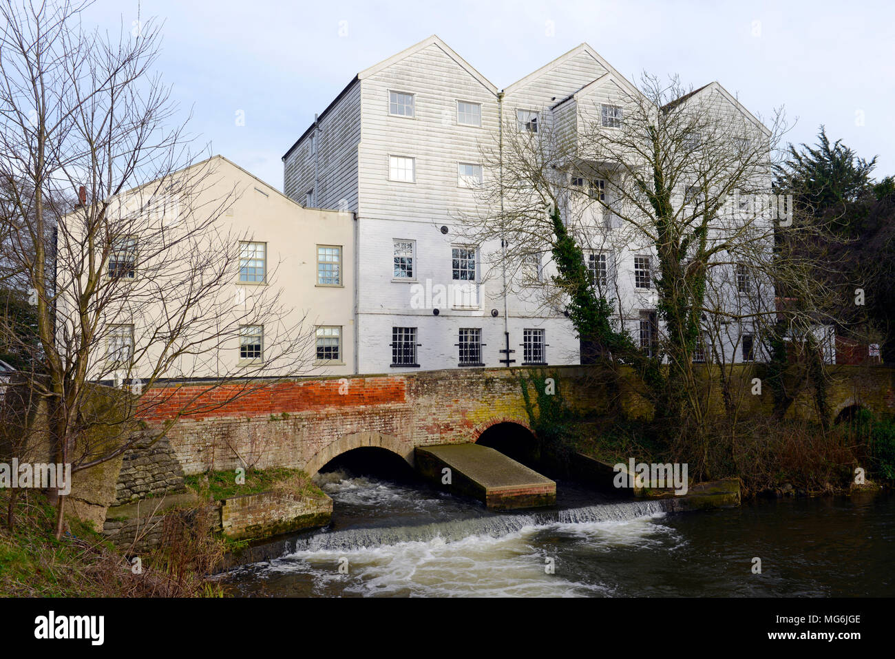 White painted wooden mill building on River Bure at Buxton Mill, Lammas, Norfolk, England Stock Photo