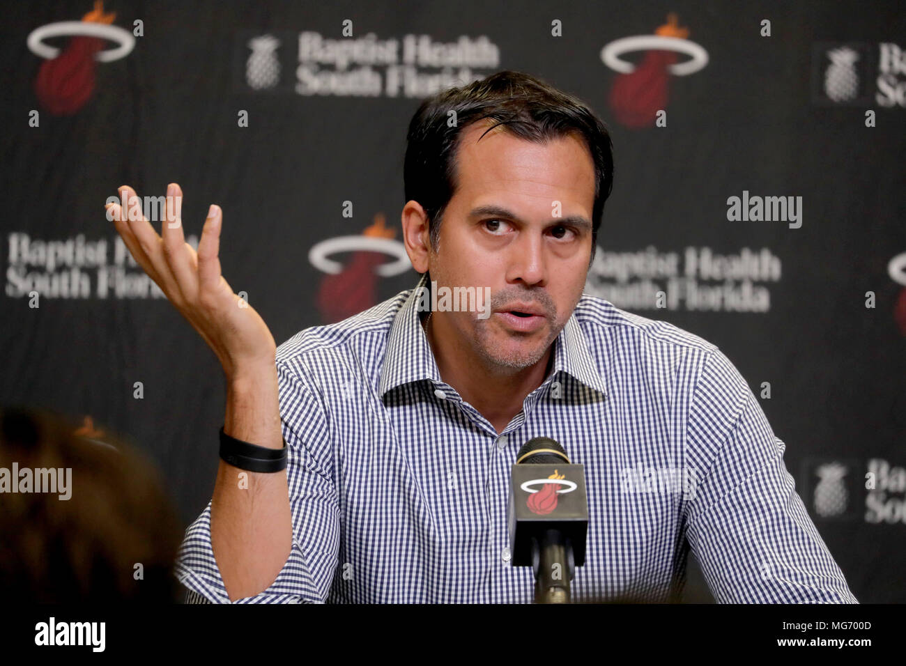 Miami Heat head coach Erik Spoelstra, right, presents a 2011-12