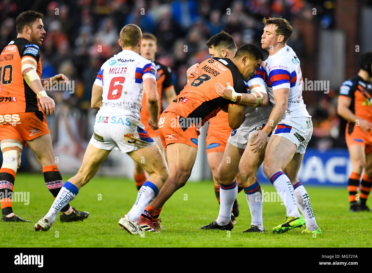 27th April 2018 , Mend-A-Hose Jungle, Castleford, England; Betfred Super League rugby, Castleford Tigers v Wakefield Trinity; Castleford Tigers' Junior Moors gets tackled by Wakefield Trinity Wildcats' Craig Huby Stock Photo