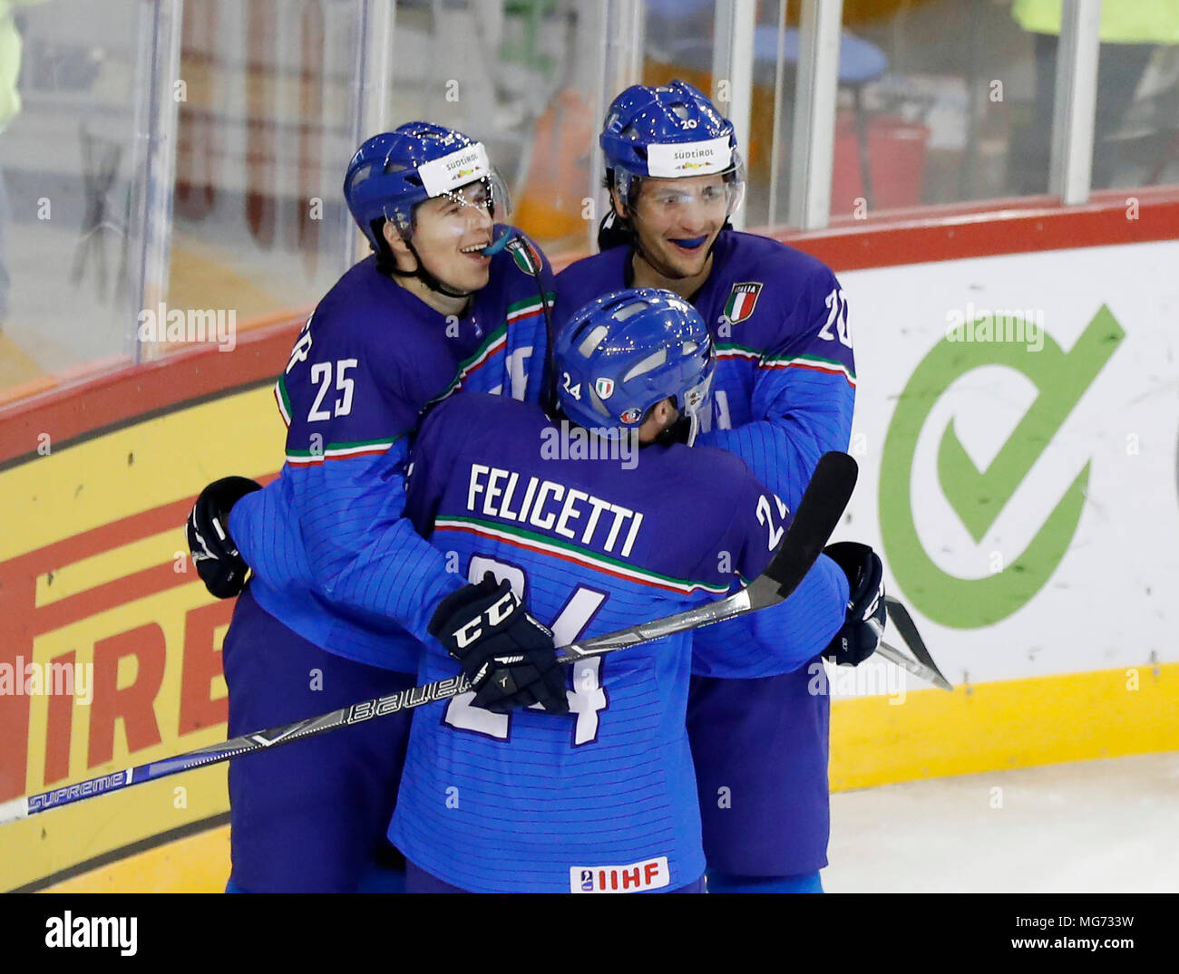 Budapest, Hungary, 27 April 2018. (l-r) Alex Lambacher of Italy, Luca  Felicetti of Italy and Ivan Deluca of Italy celebrate the first Italian  score during the 2018 IIHF Ice Hockey World Championship