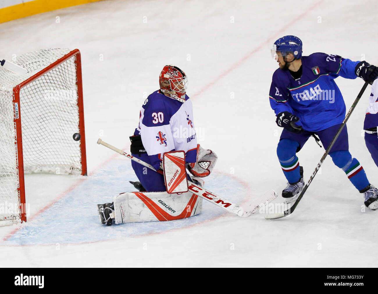 Budapest, Hungary, 27 April 2018.  (l-r) Goalie Ben Bowns of Great Britain cannot save next to Tommaso Goi of Italy during the 2018 IIHF Ice Hockey World Championship Division I Group A match between Italy and Great Britain at Laszlo Papp Budapest Sports Arena on April 27, 2018 in Budapest, Hungary. Credit: Laszlo Szirtesi/Alamy Live News Stock Photo