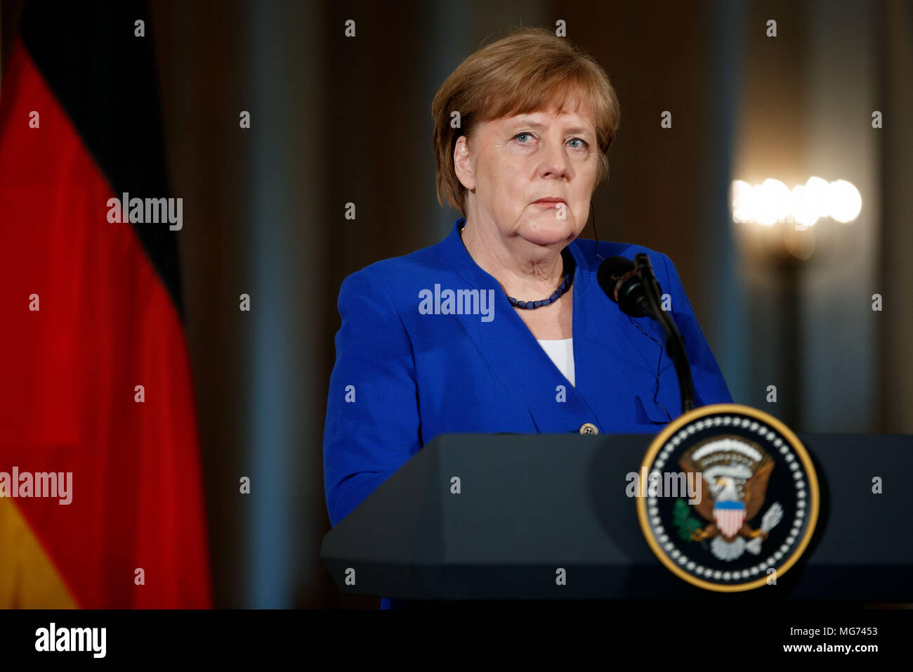 Washington, USA. 27th Apr, 2018. German Chancellor Angela Merkel attends a joint press conference with U.S. President Donald Trump (not in the picture) at the White House in Washington, DC, the United States, on April 27, 2018. Credit: Ting Shen/Xinhua/Alamy Live News Stock Photo