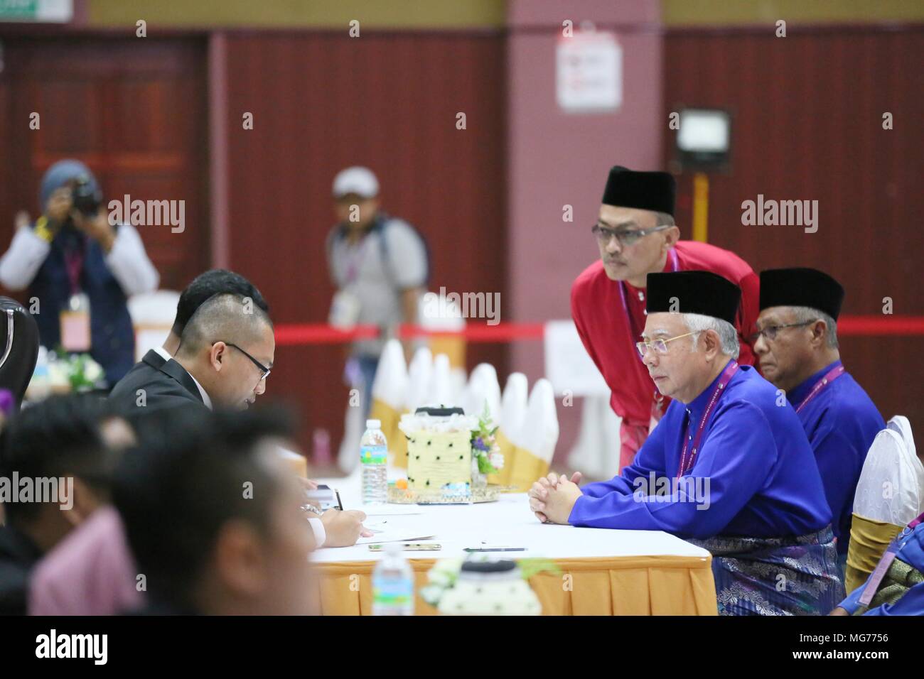 Pekan, Malaysia. 28th Apr, 2018. Malaysian caretaker Prime Minister Najib Razak(2nd R) submits the nomination paper for the upcoming general election in Pekan in eastern state of Pahang, Malaysia, on April 28, 2018. Candidates contesting the Malaysian general election submitted their nomination papers on Saturday morning, formally kicking off an 11-day election campaign in which the ruling Barisan Nasional (BN) coalition, led by caretaker Prime Minister Najib Razak, is seeking a new mandate. Credit: Zhu Wei/Xinhua/Alamy Live News Stock Photo