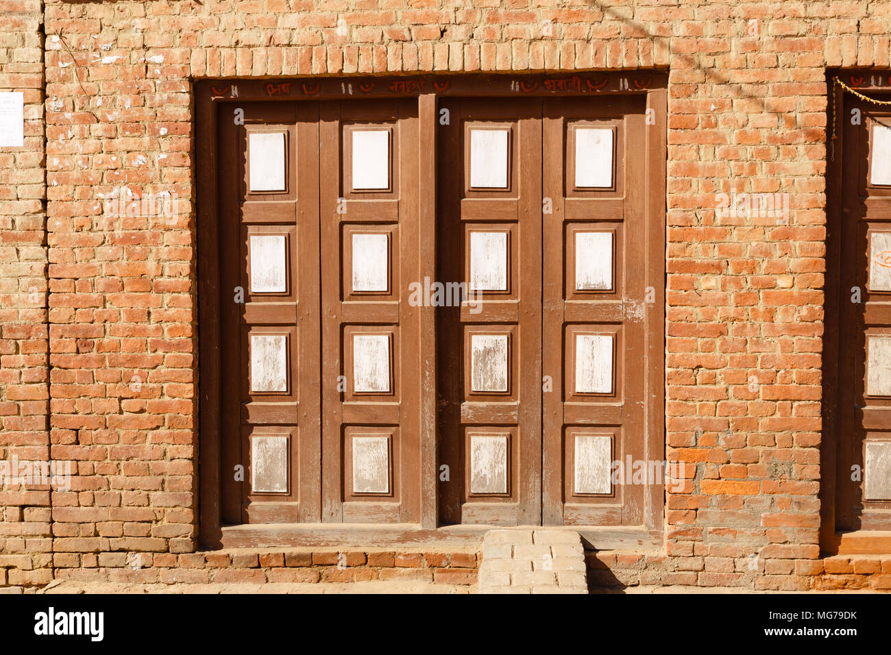 Wooden carved doors of an old house, Nepal Stock Photo