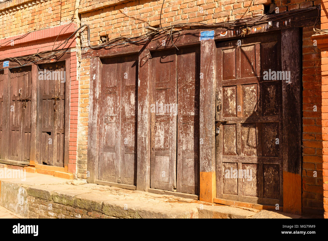 Wooden carved doors of an old house Stock Photo