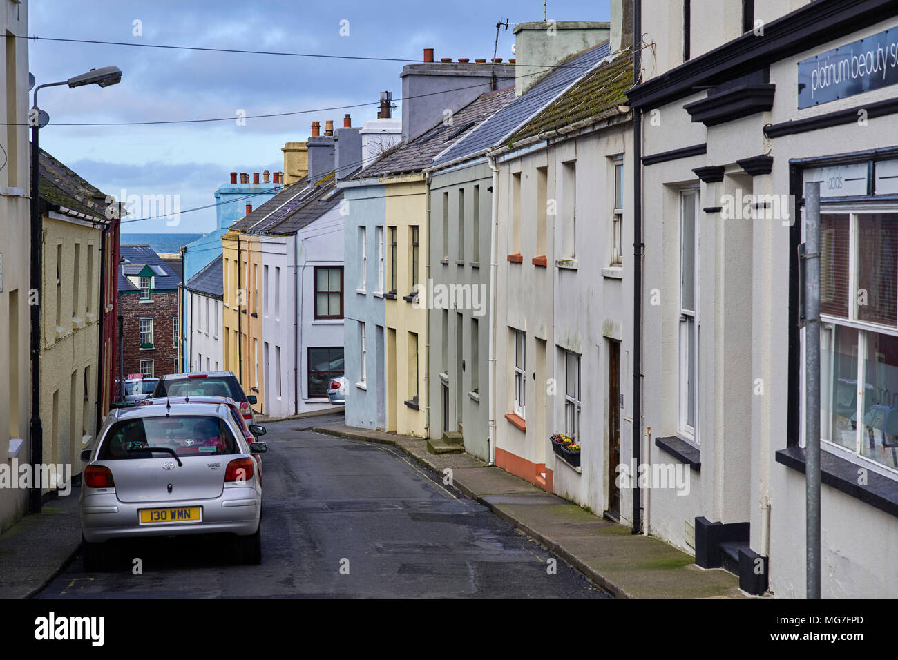 Small terraced painted houses in Bridge Street in Peel, Isle of Man