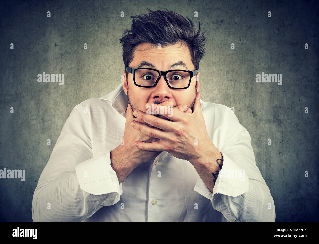 Man scared hands face hi-res stock photography and images - Alamy