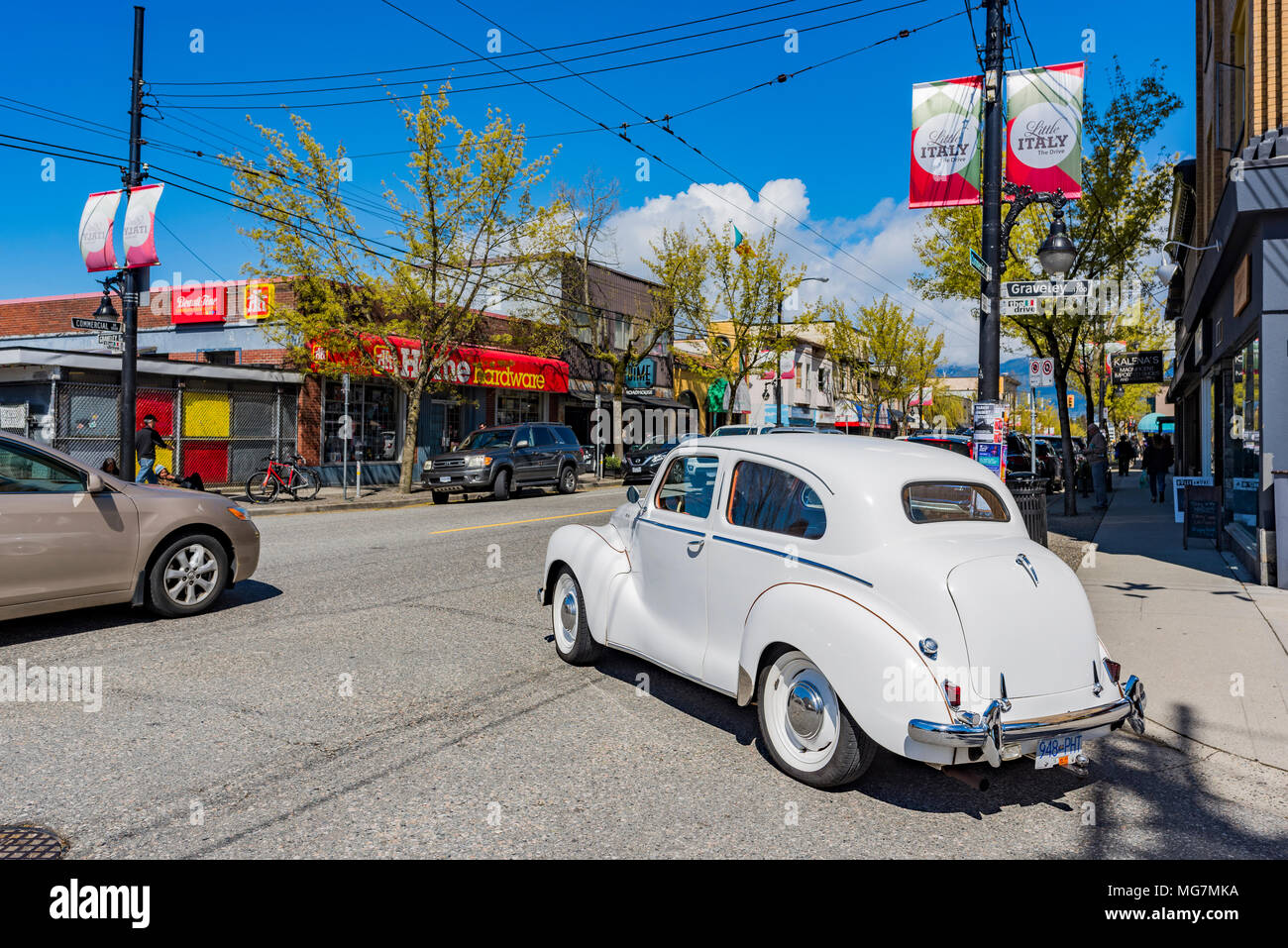 Cars, traffic, Commercial Drive, Vancouver, British Columbia, Canada. Stock Photo