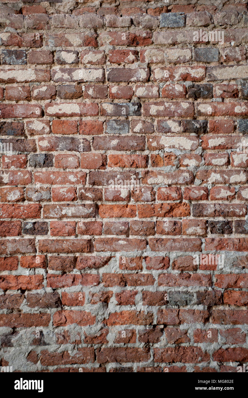 Antique handmade brick wall found in historic Jamestown settlement restoration in Virginia Stock Photo