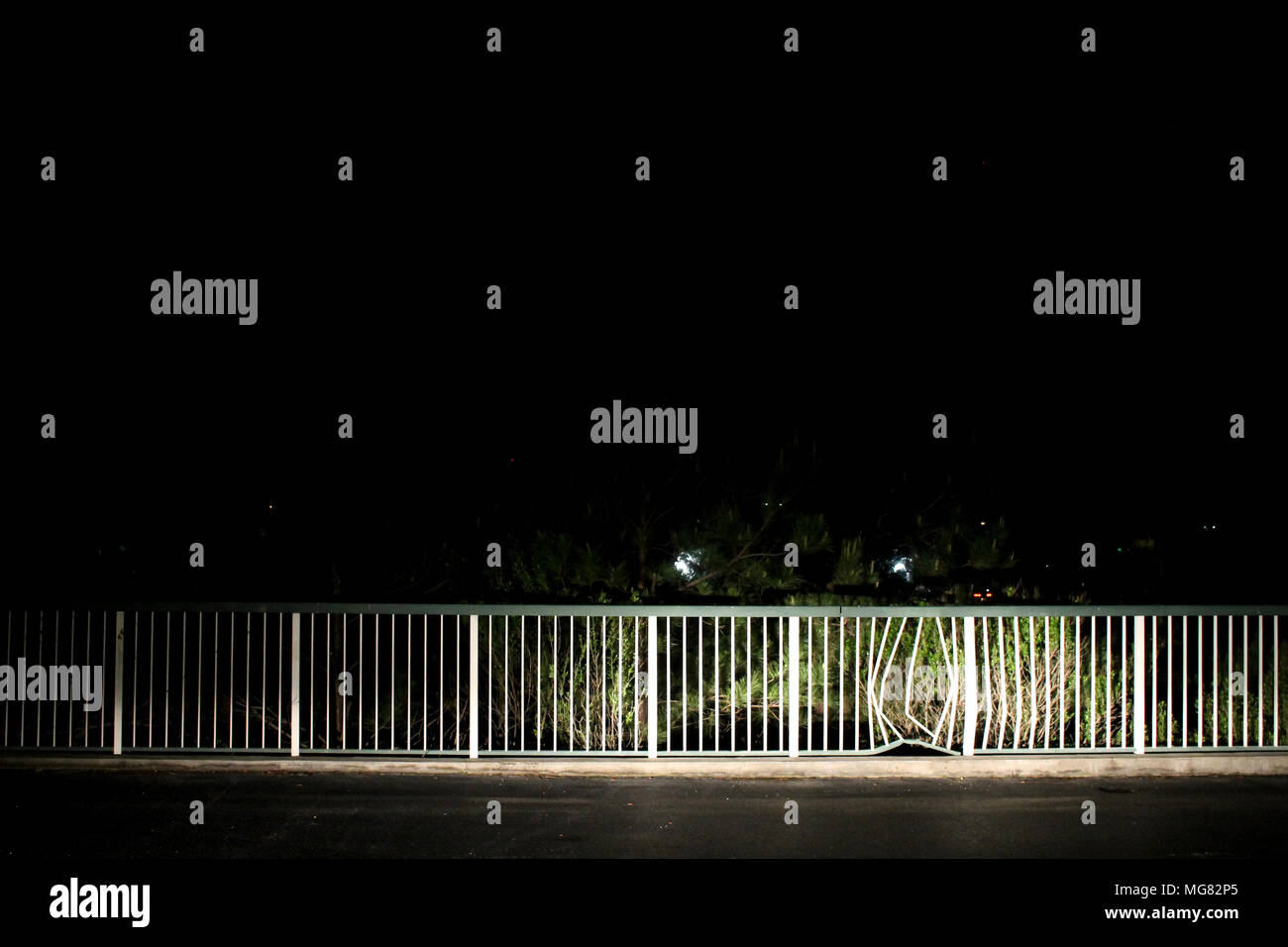 Railing at night Stock Photo - Alamy