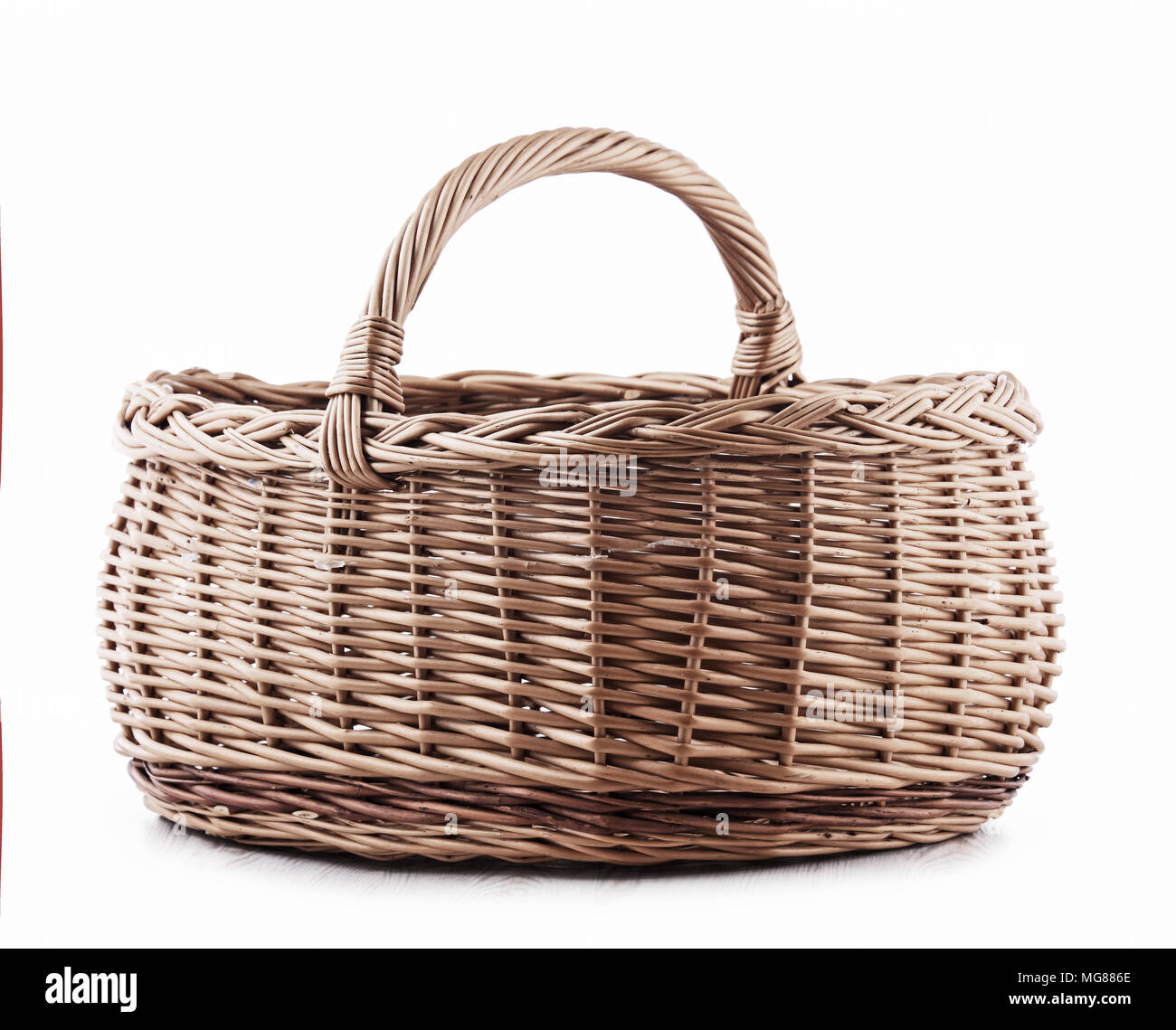 Empty wicker basket isolated on white background Stock Photo - Alamy