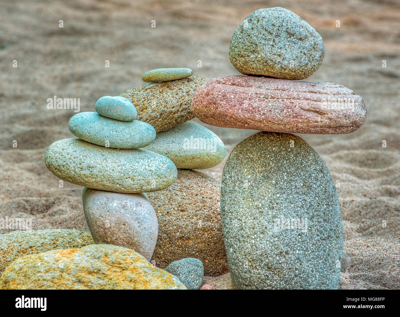 A grouping of stacked river rock found on the banks of the Sandy River at Oxbow Park near Gresham, Oregon.  A section of the beach is filled with stac Stock Photo