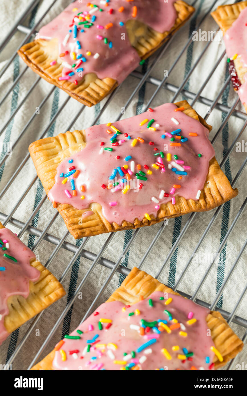 Sweet Homemade Strawberry Toaster Pastries with Sprinkles Stock Photo