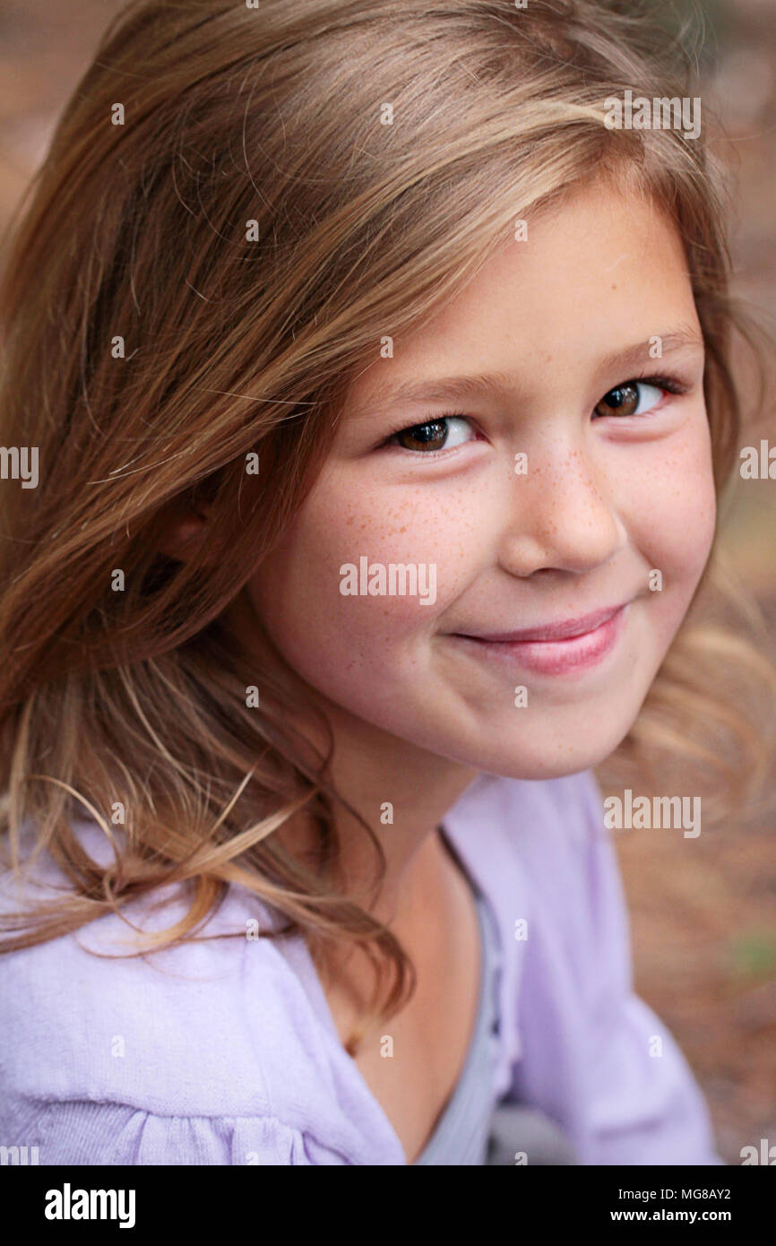 Pretty young girl smiling Stock Photo