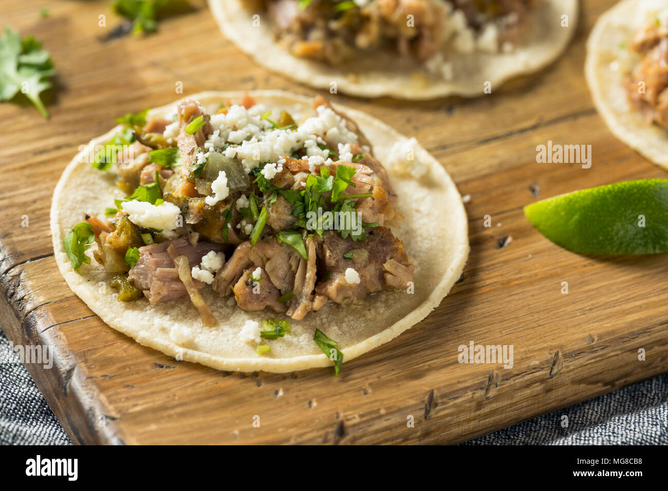 Homemade Pork Carnitas Tacos with Cilantro and Cojita Stock Photo Alamy