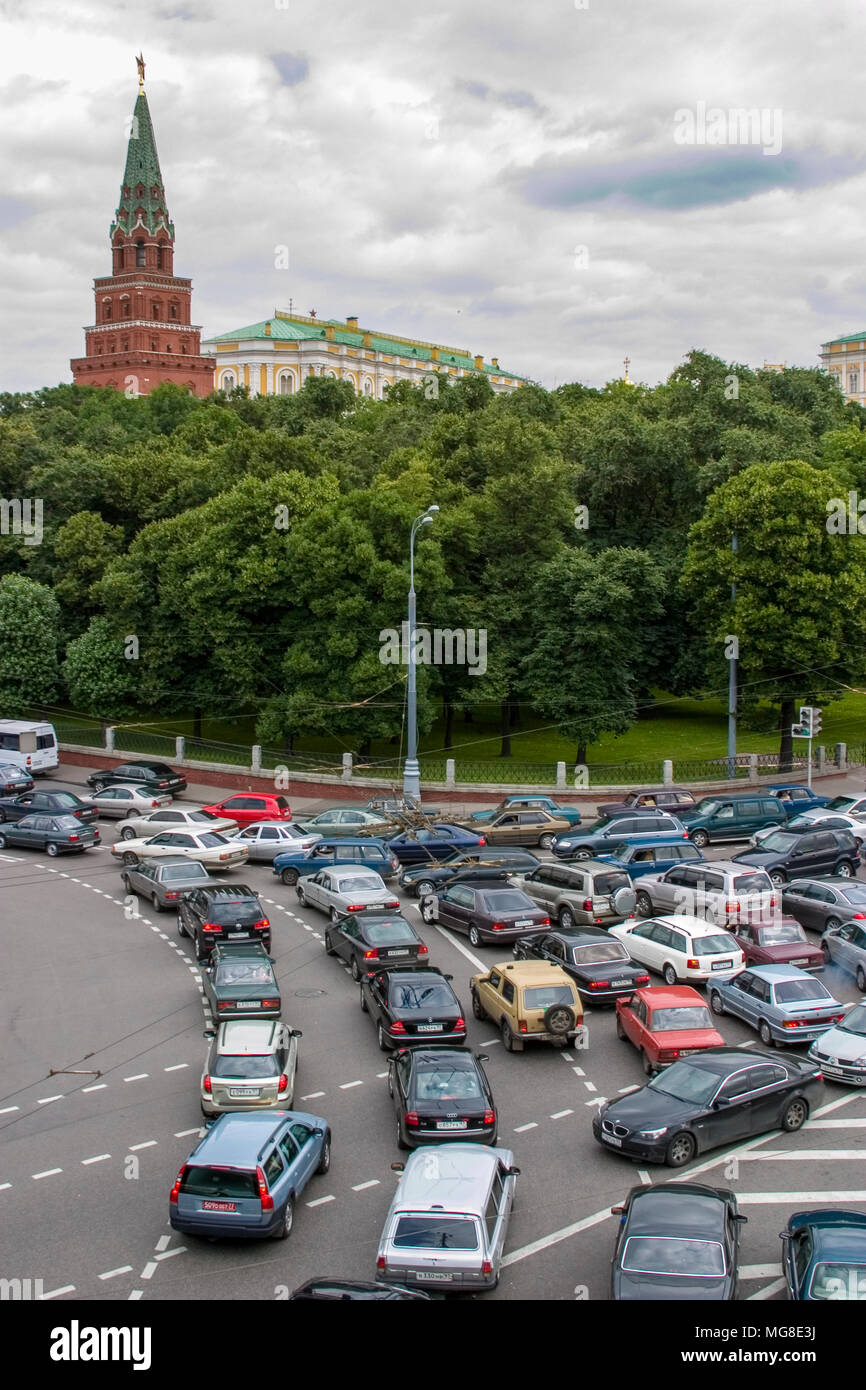 Traffic jam in Moscow near the Kremlin; Borovitskaya Tower in the Kremlin in background. Stock Photo
