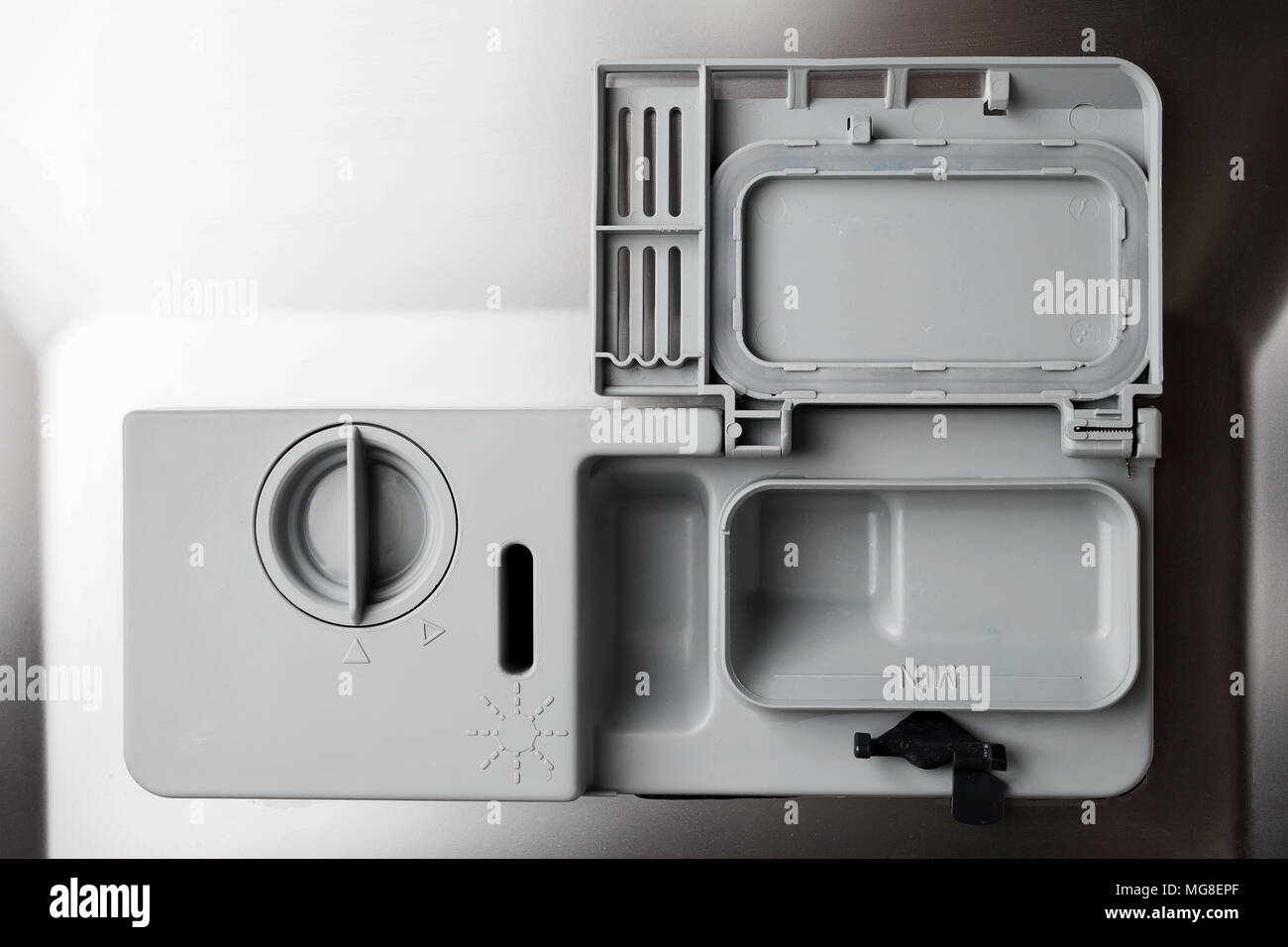 loading of powder, salt and conditioner into the washing machine