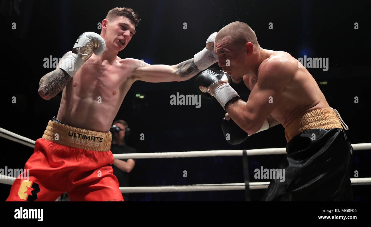 Drew Brown (left) and Sam Evans compete in Semi Final 1 of the Ultimate Boxxer competition at the M.E.N. Arena, Manchester. Stock Photo