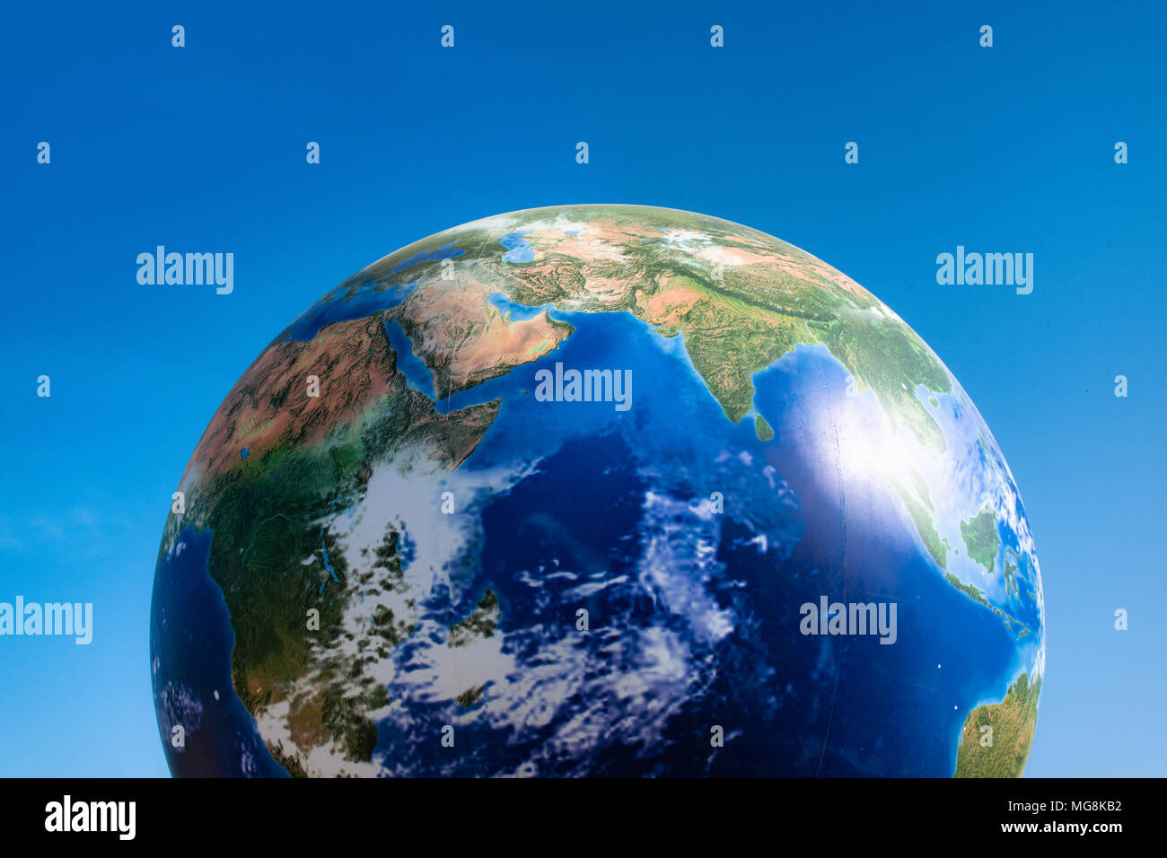 Earth globe section africa asia ocean and southern hemisphere planet ball over blue sky copy space Stock Photo