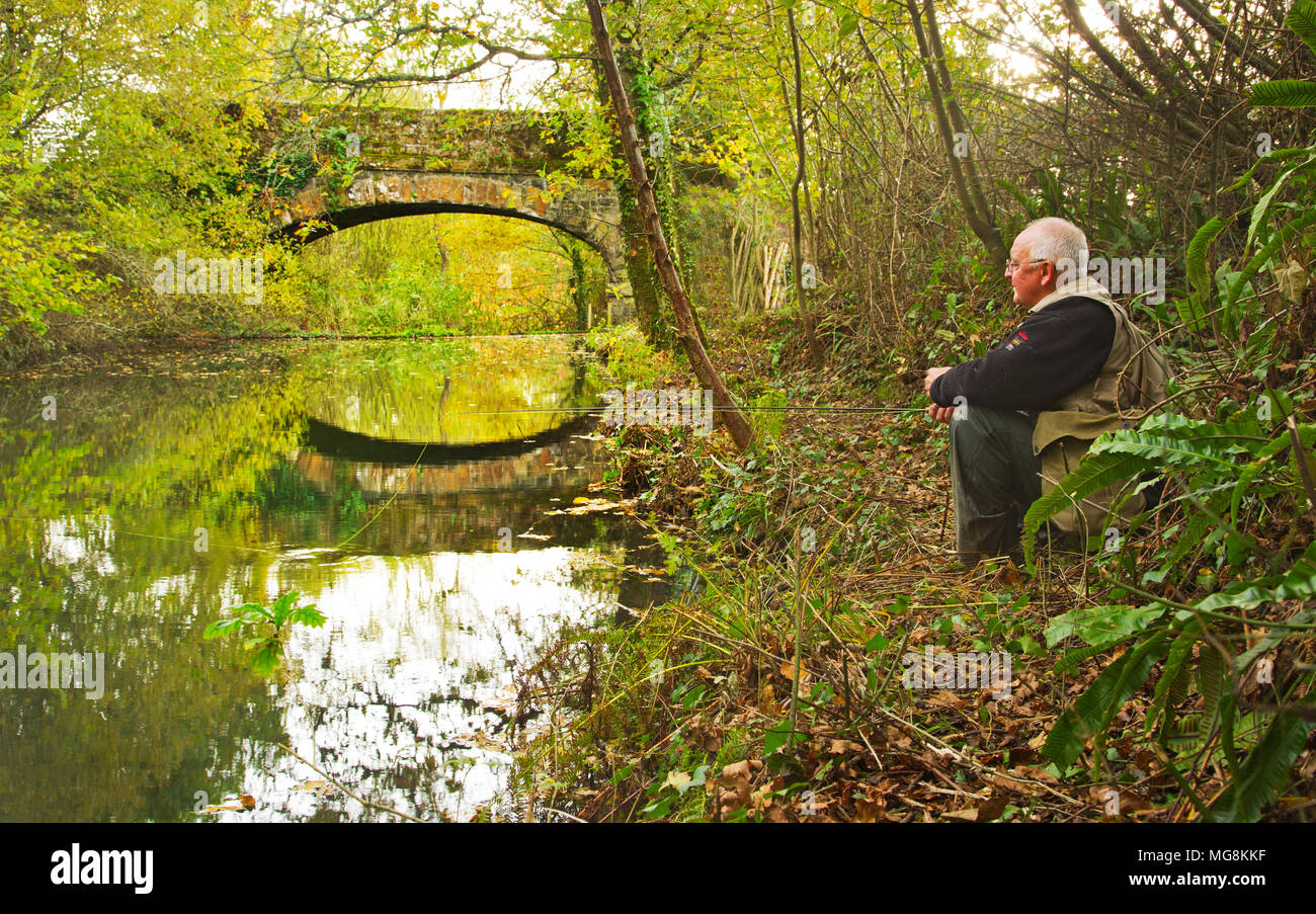 A middle aged retired man fishing Stock Photo