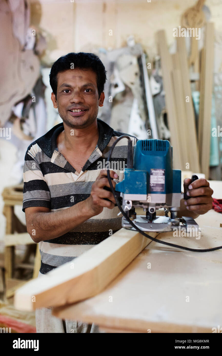 Carpenter in his workshop, Kuwait Stock Photo