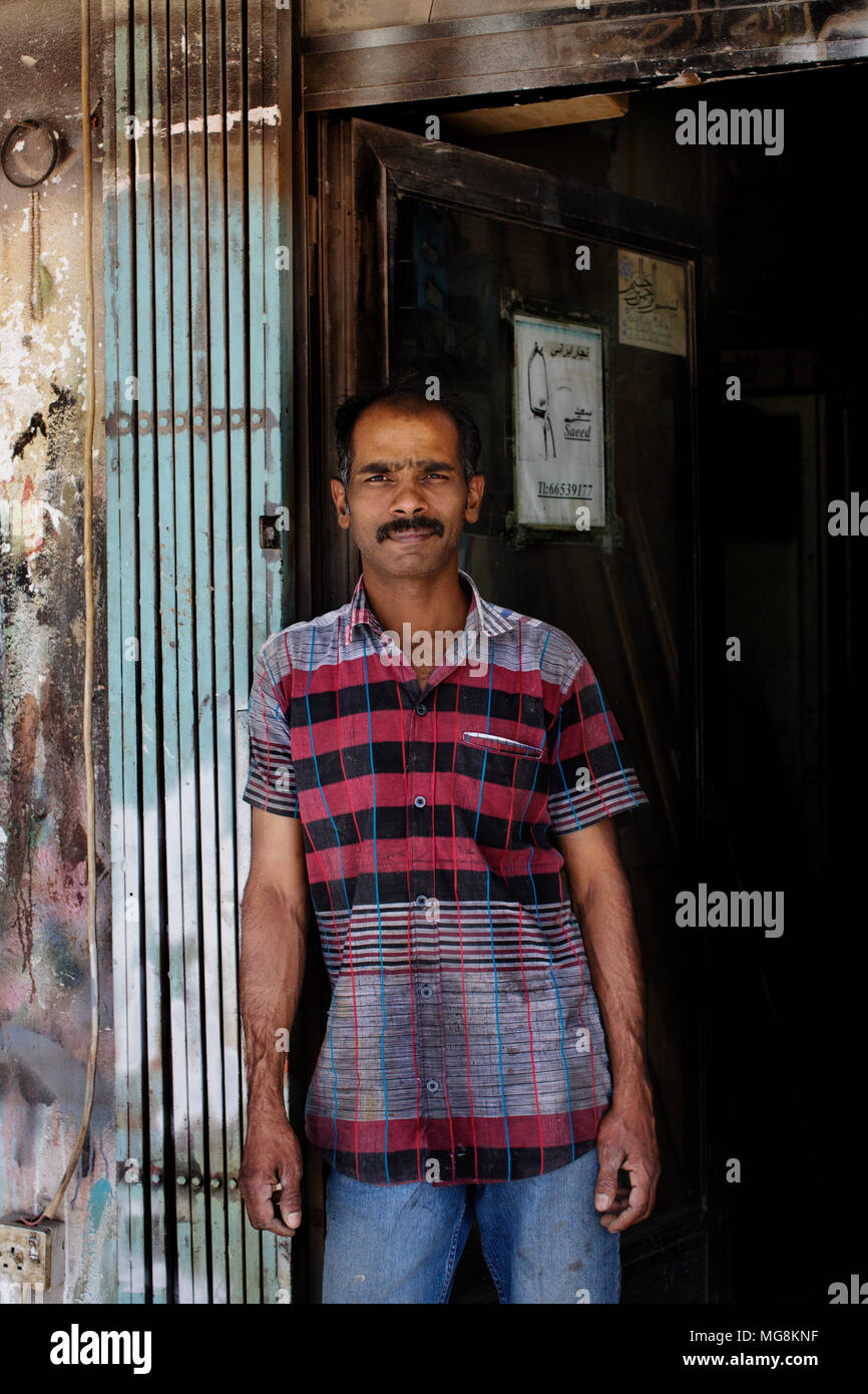 Repair man in his workshop, Kuwait Stock Photo