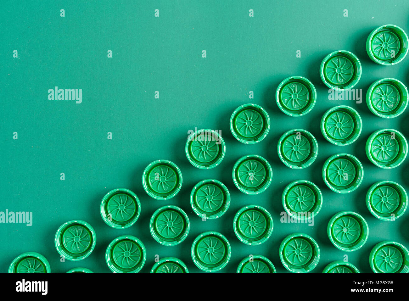 green caps from plastic bottles Stock Photo