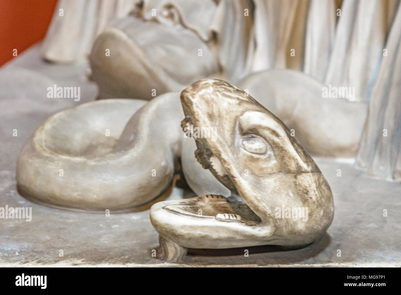 Close up detail view of snake sculpture with open mouth Stock Photo