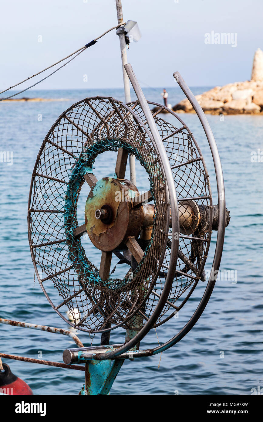 fishing boat net winch on port Stock Photo - Alamy