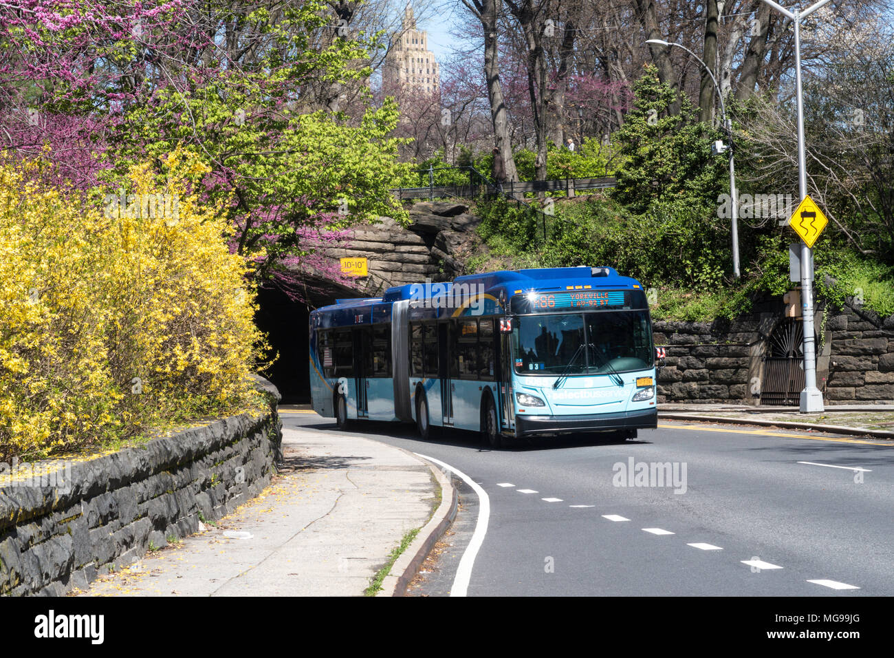 Traffic on the 86th Street Transverse through Central Park, NYC, USA Stock Photo