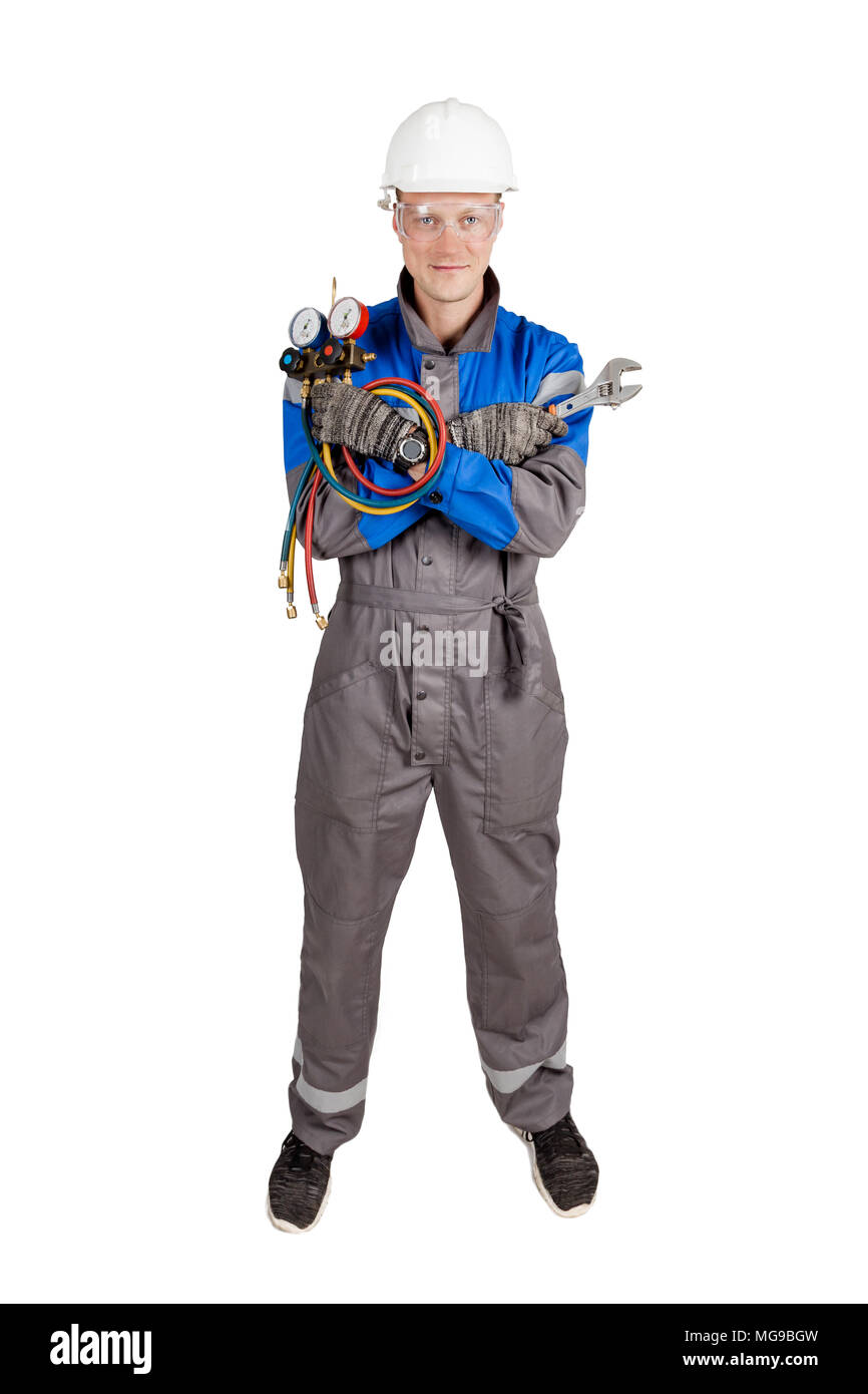 Builder, installer of ventilation with tools in hands Stock Photo