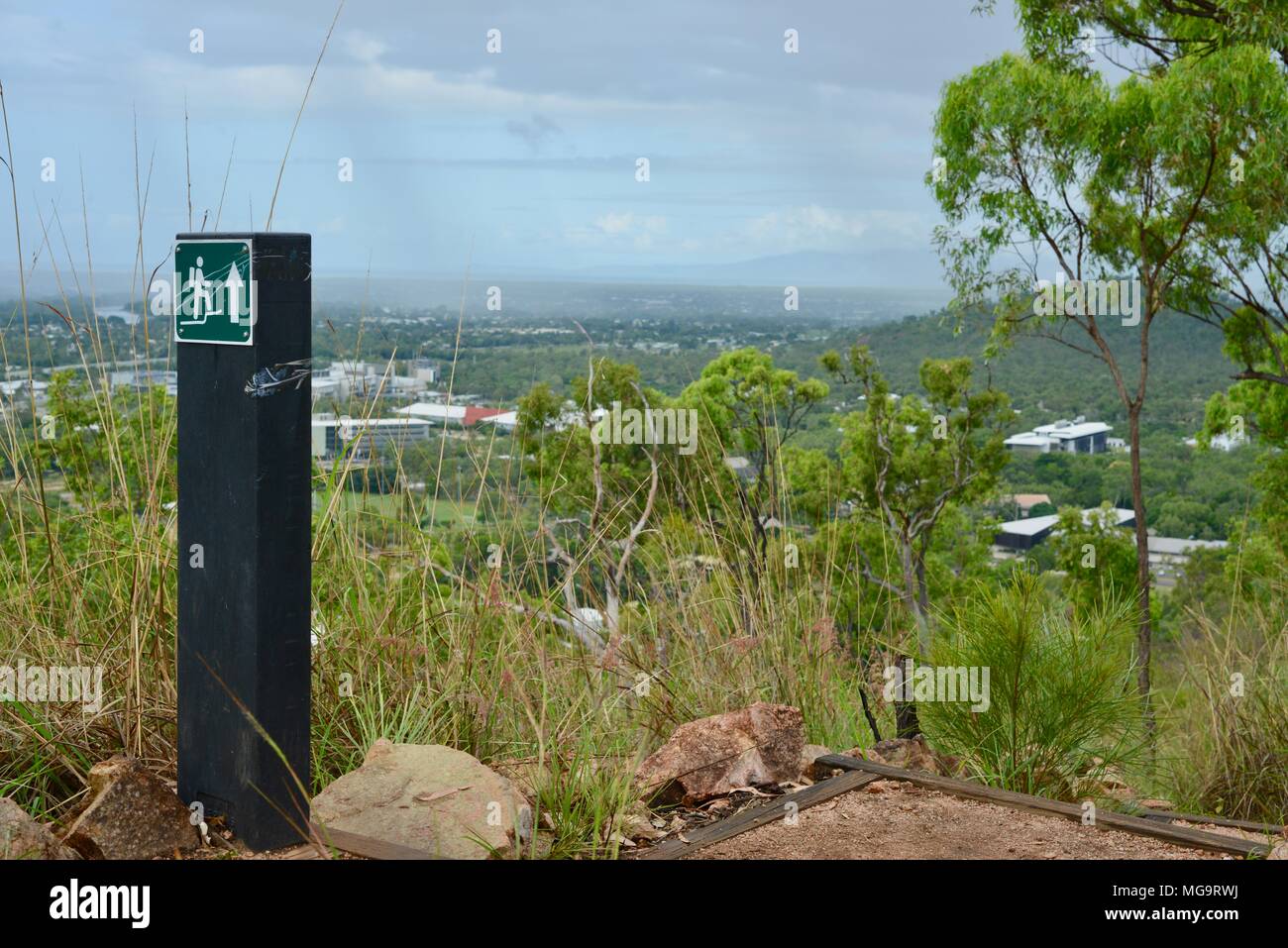 hiking-man-with-arrow-pointing-up-sign-mount-stuart-hiking-trails