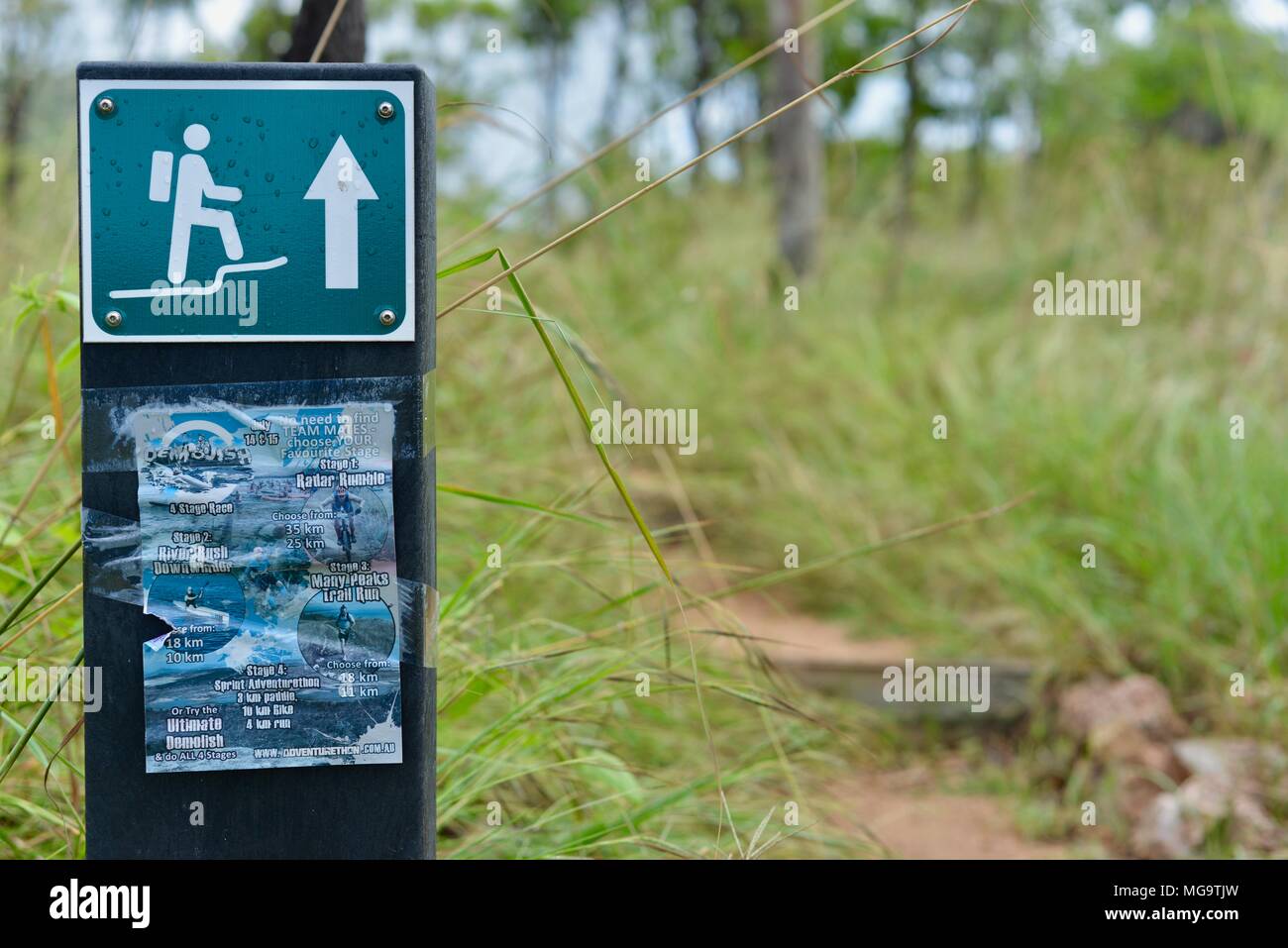 hiking-man-with-arrow-pointing-up-sign-mount-stuart-hiking-trails
