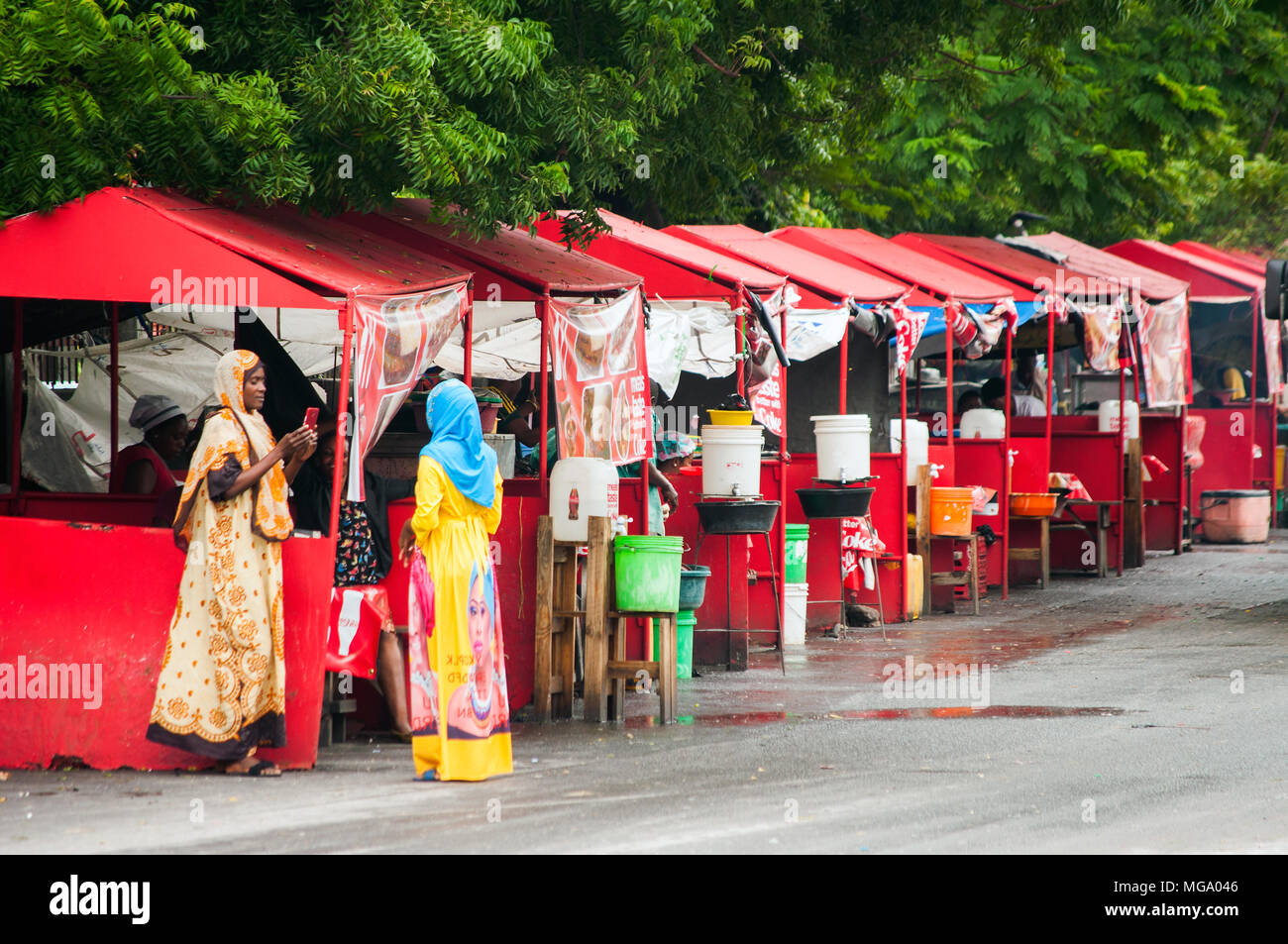 Row of fast food and barbecue kitchens on Bibi Titi Mohammed Street, Dar es Salaam, Tanzania Stock Photo