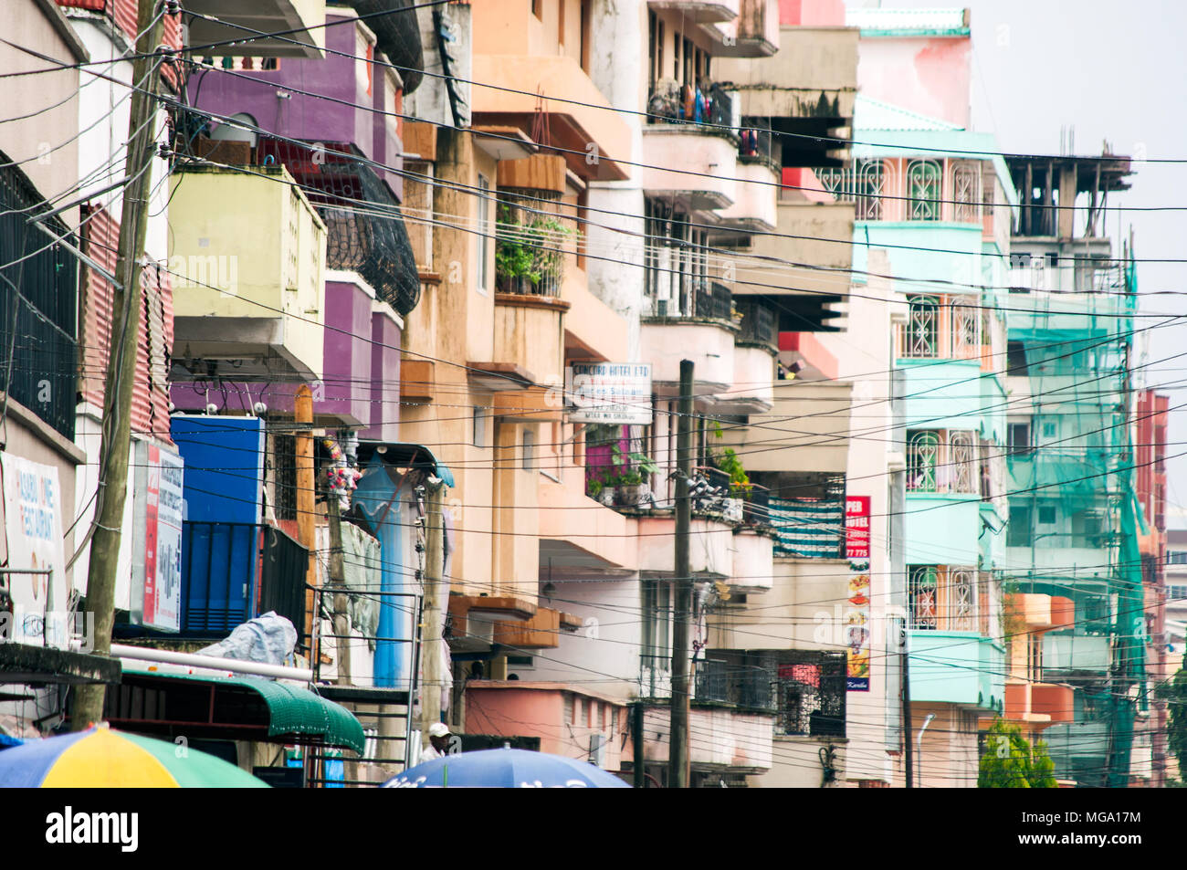 Row of aged apartment buildings in Kariakoo, Dar es Salaam, Tanzania Stock Photo