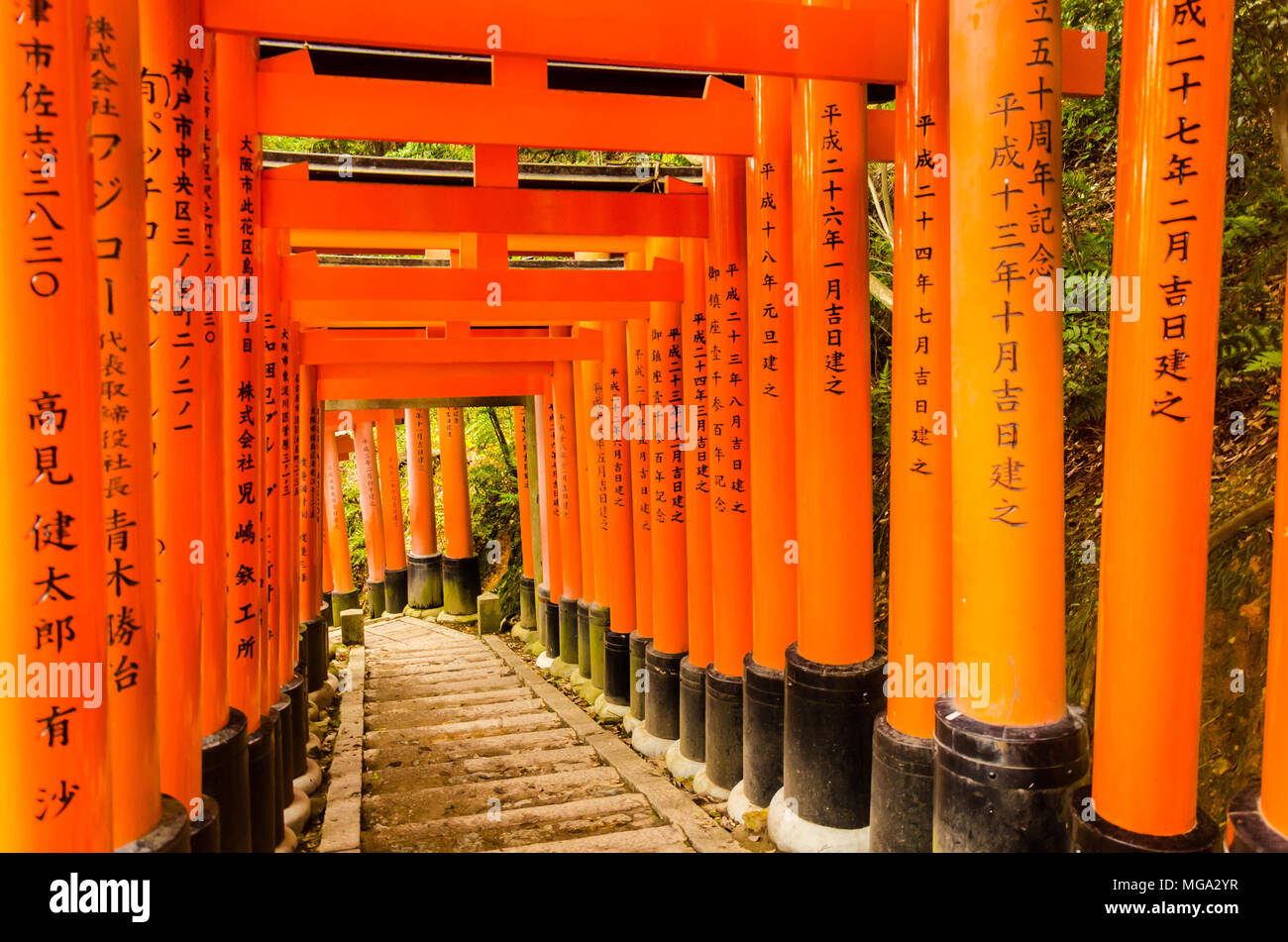 Japanese red wood with japanese kanji characters and letters Stock Photo