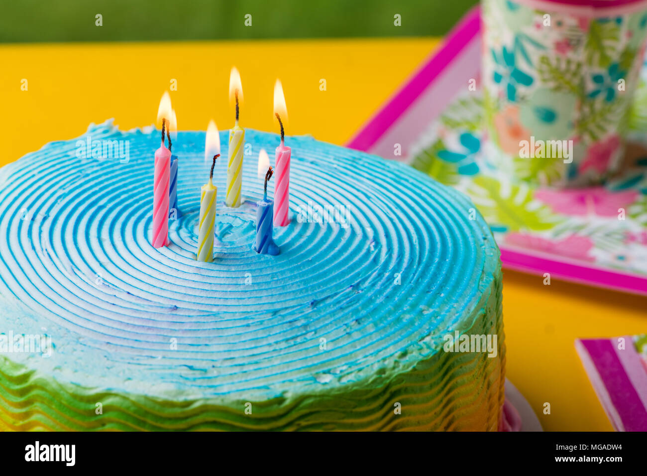 Birthday cake with candles lit hi-res stock photography and images - Alamy