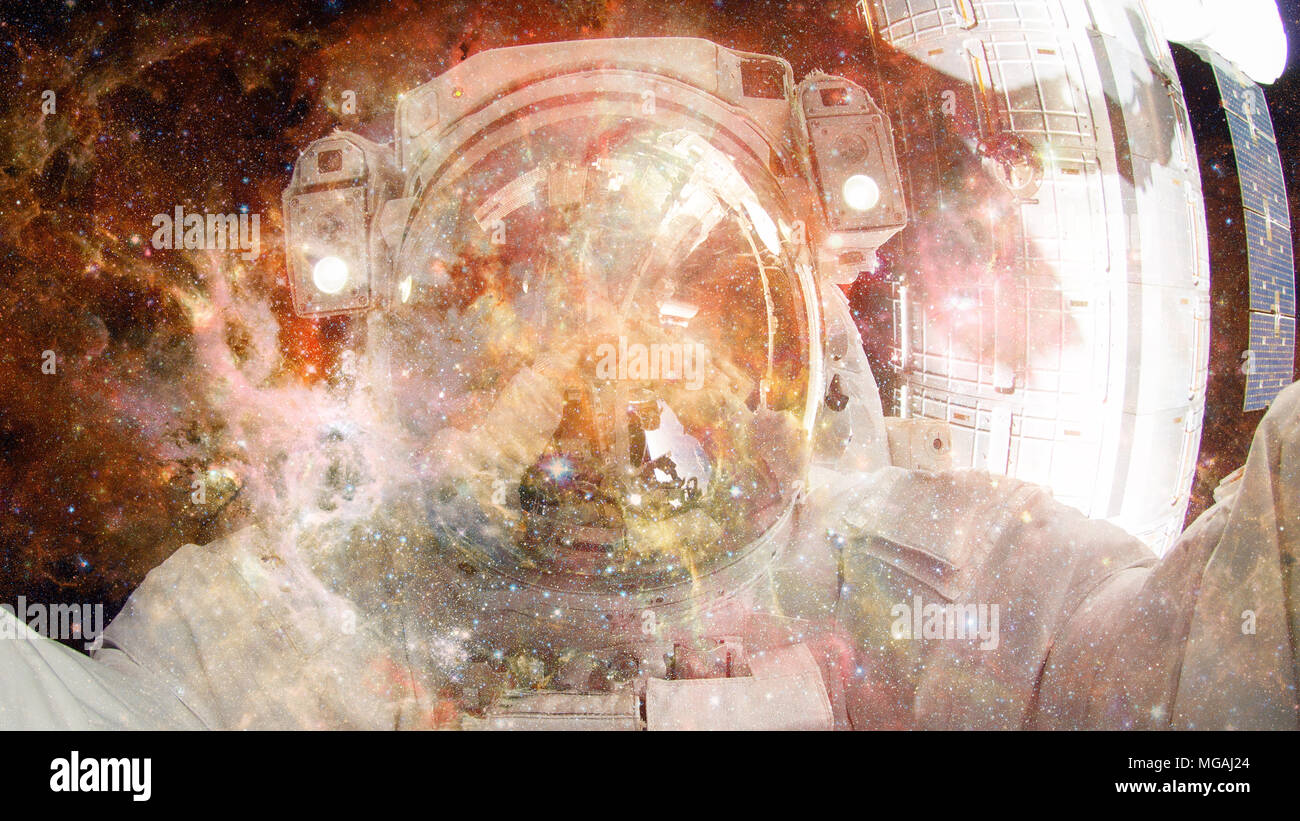 Astronaut in outer space. Science fiction art. Elements of this image ...