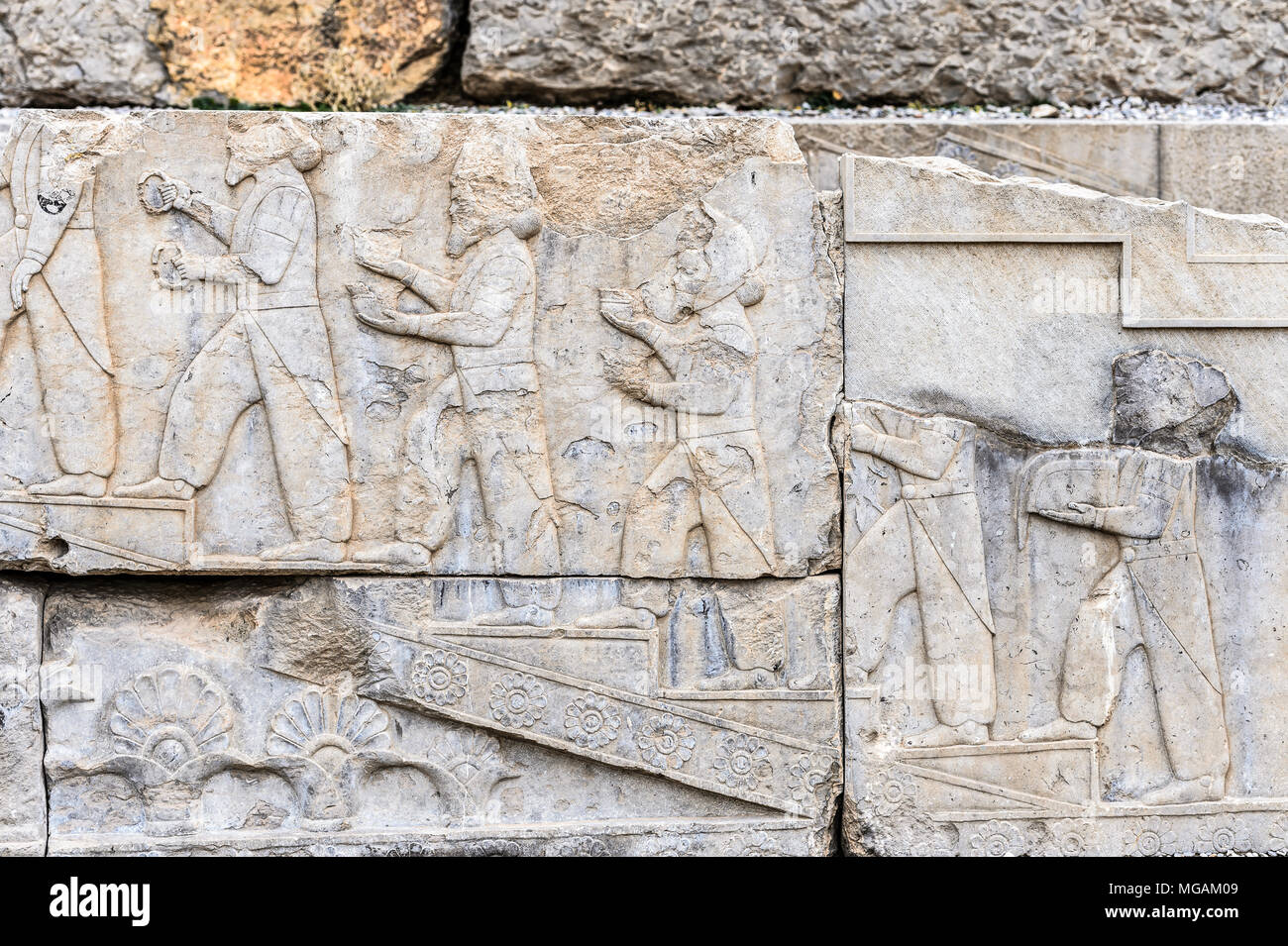Ancient stone relief in Persepolis, the ceremonial capital of the ...