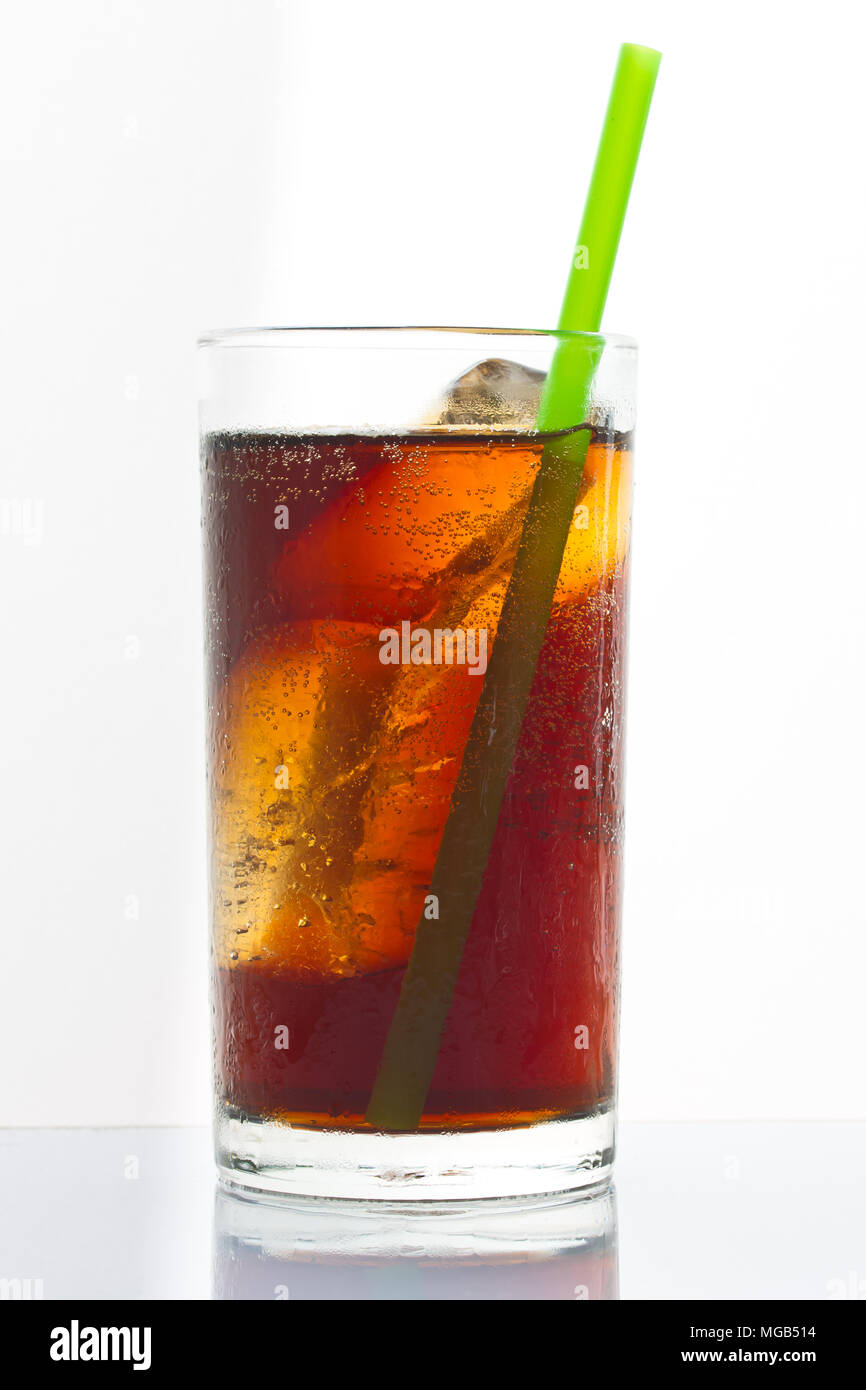 Cola with crushed ice and straw in glass on white background Stock ...