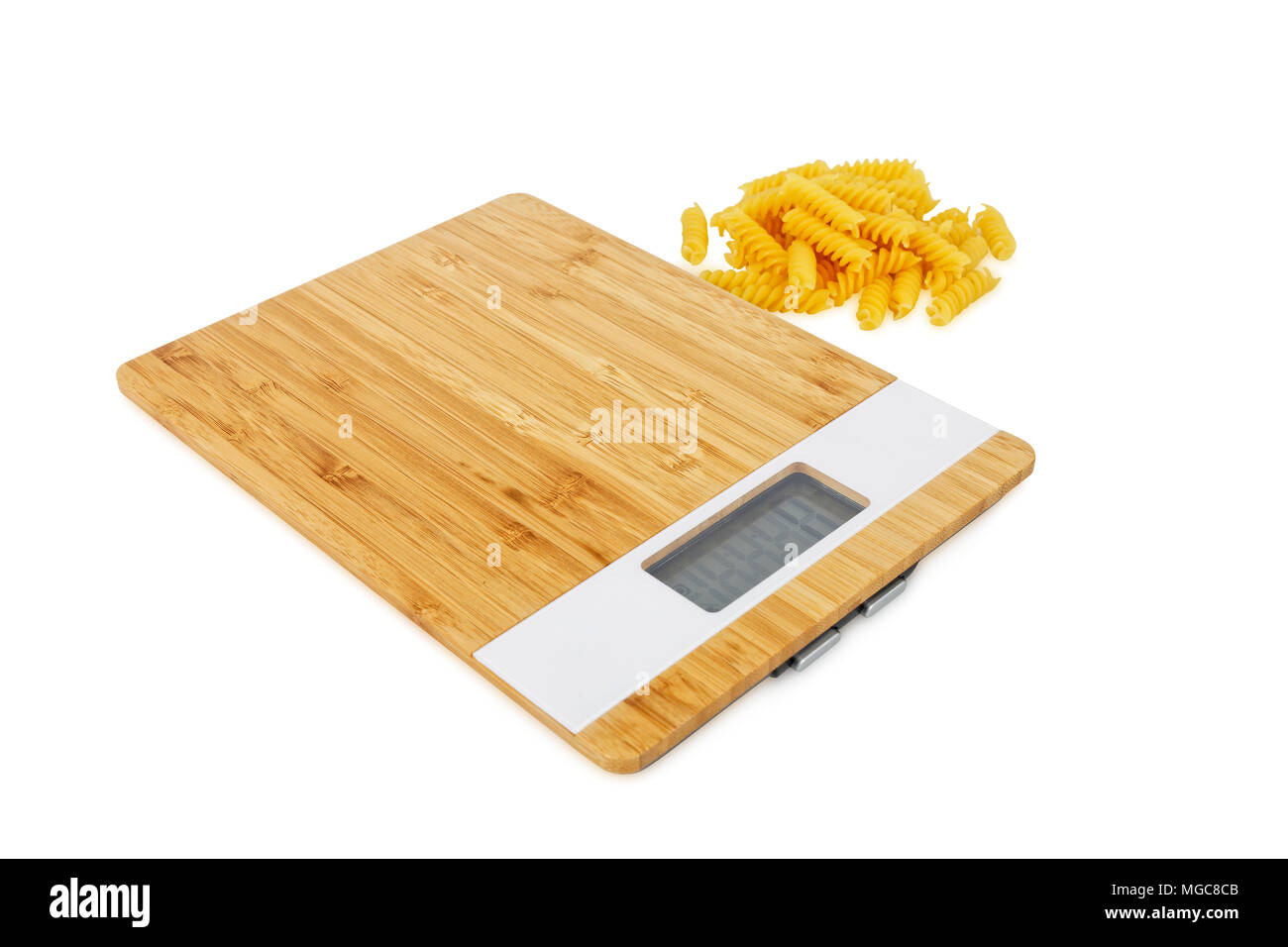 digital kitchen scale and pasta isolated on white background Stock Photo