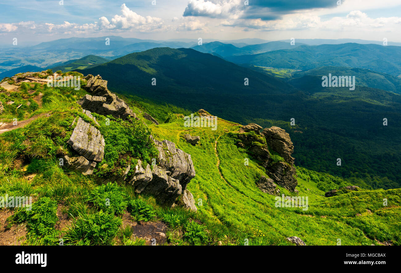 rocky cliff over the valley. beautiful mountain landscape in summer Stock Photo