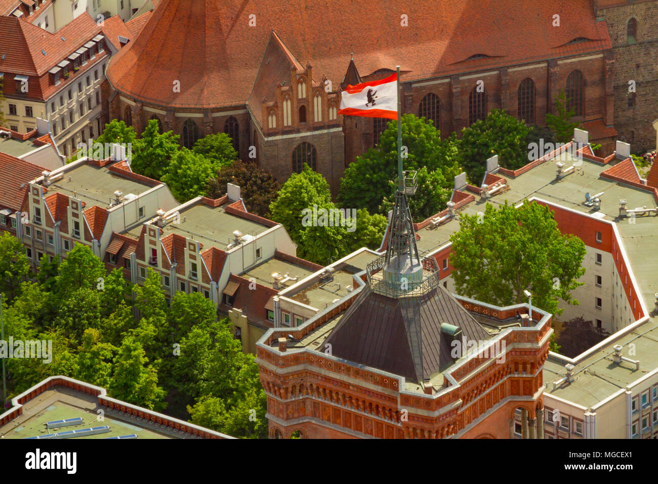 Aerial view of the flag of berlin on the top of Rotes Rathaus (Red City Hall) building. Stock Photo