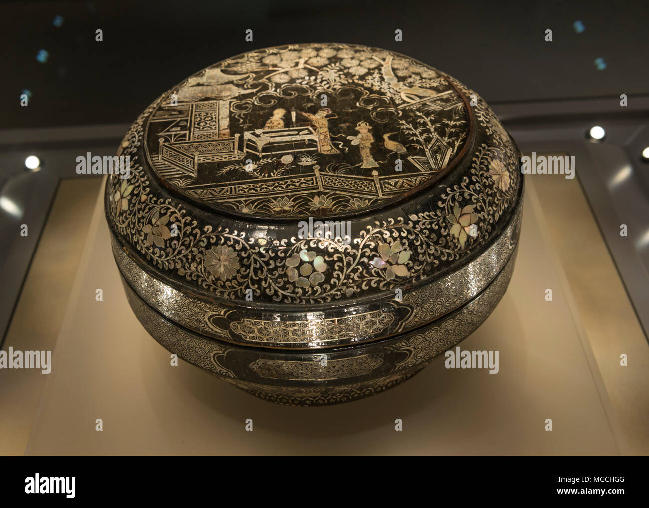 A black lacquer sewing box inlaid with mother-of-pearl from the late Song Dynasty (960–1279) or early Yuan Dynasty (1279–1368), donated by entrepreneurial couple Cao Qiyong and Luo Bizhen to Zhejiang Museum, China. Stock Photo