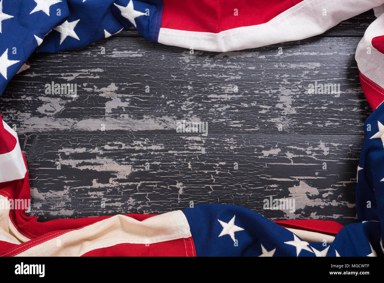 An old american flag on a antique wooden platform with copy space Stock ...