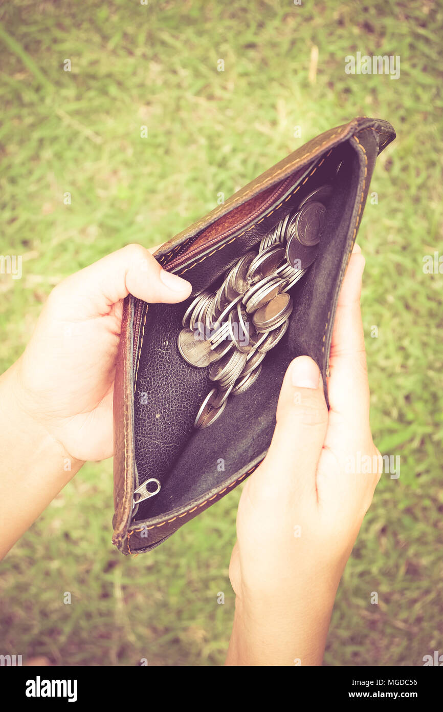 money in the wallet with filter effect retro vintage style Stock Photo