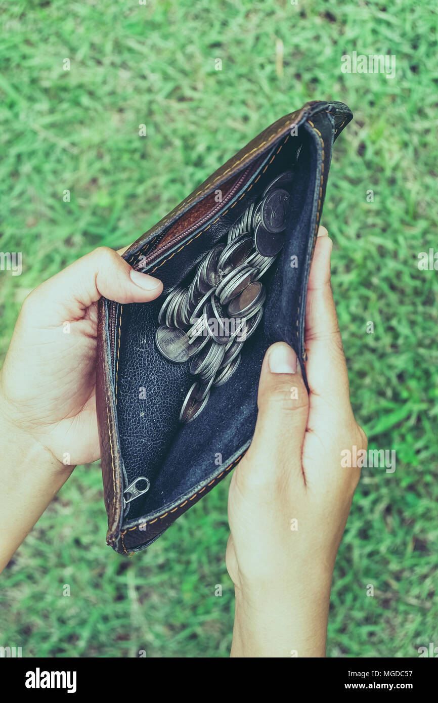 money in the wallet with filter effect retro vintage style Stock Photo