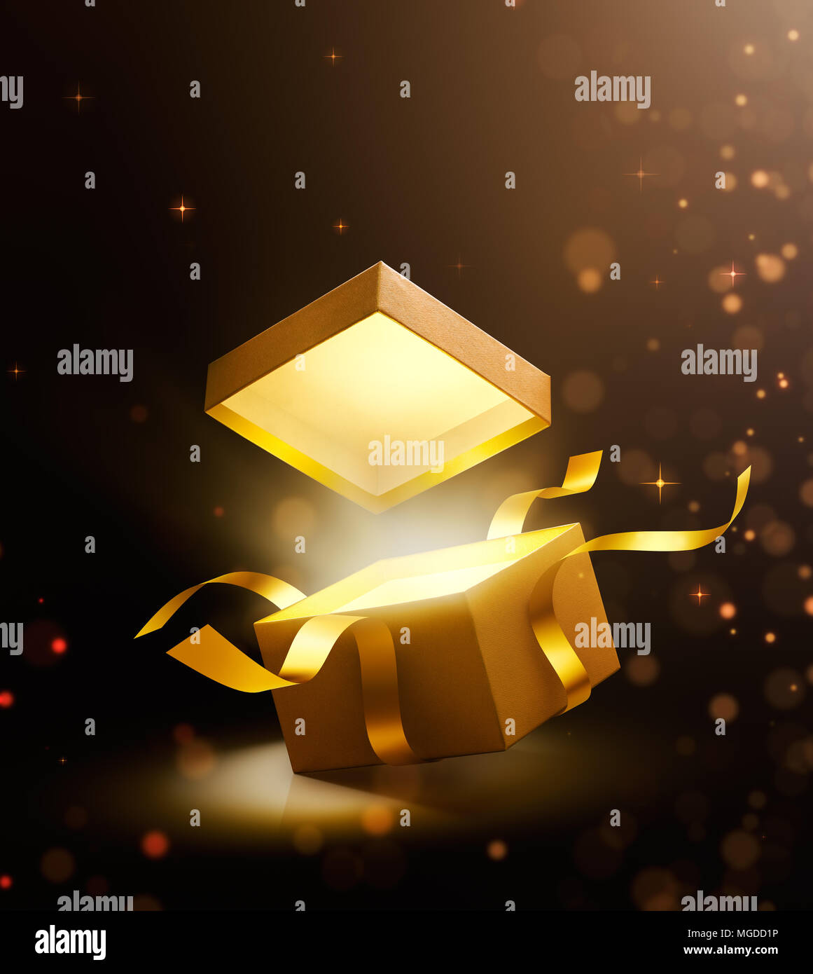 Gold open gift box with magical light Stock Photo - Alamy