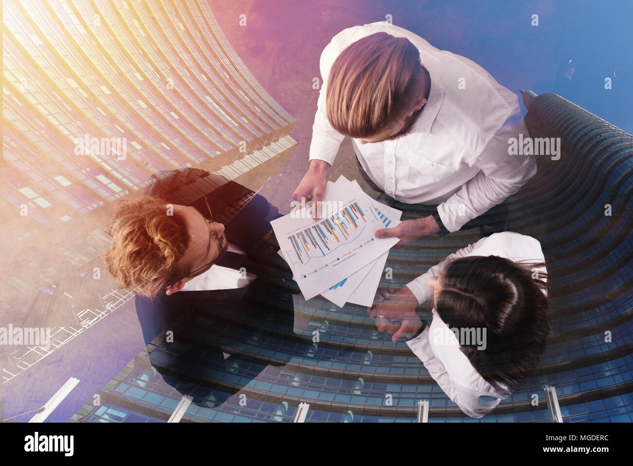 Business people works with statistics number of the company. double exposure Stock Photo